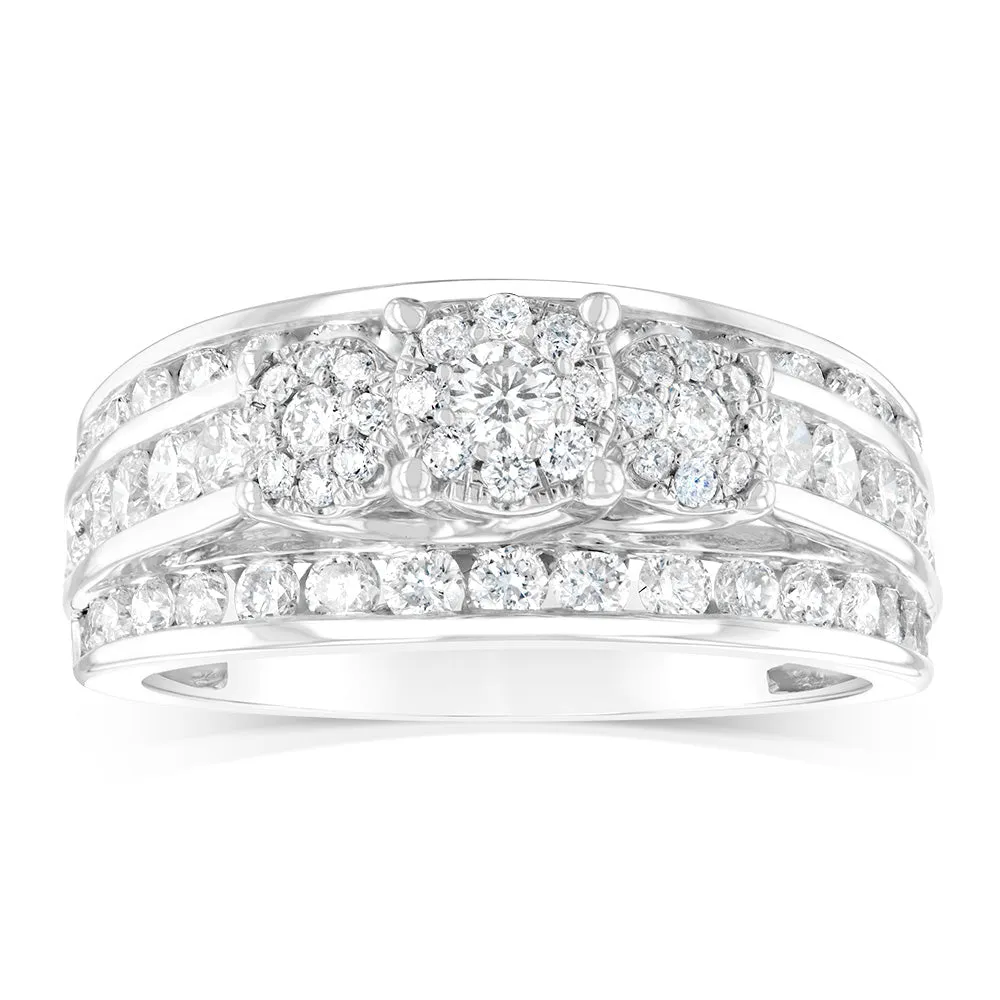 14ct White Gold 1.5 Carat Diamond Trilogy Ring with 3 Round Brilliant Cut Diamonds Surrounded by Diamond Halos and Channel Set Band