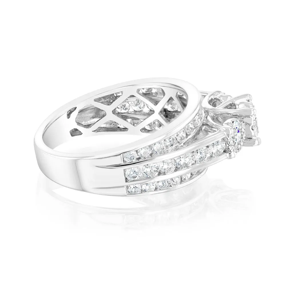14ct White Gold 1.5 Carat Diamond Trilogy Ring with 3 Round Brilliant Cut Diamonds Surrounded by Diamond Halos and Channel Set Band