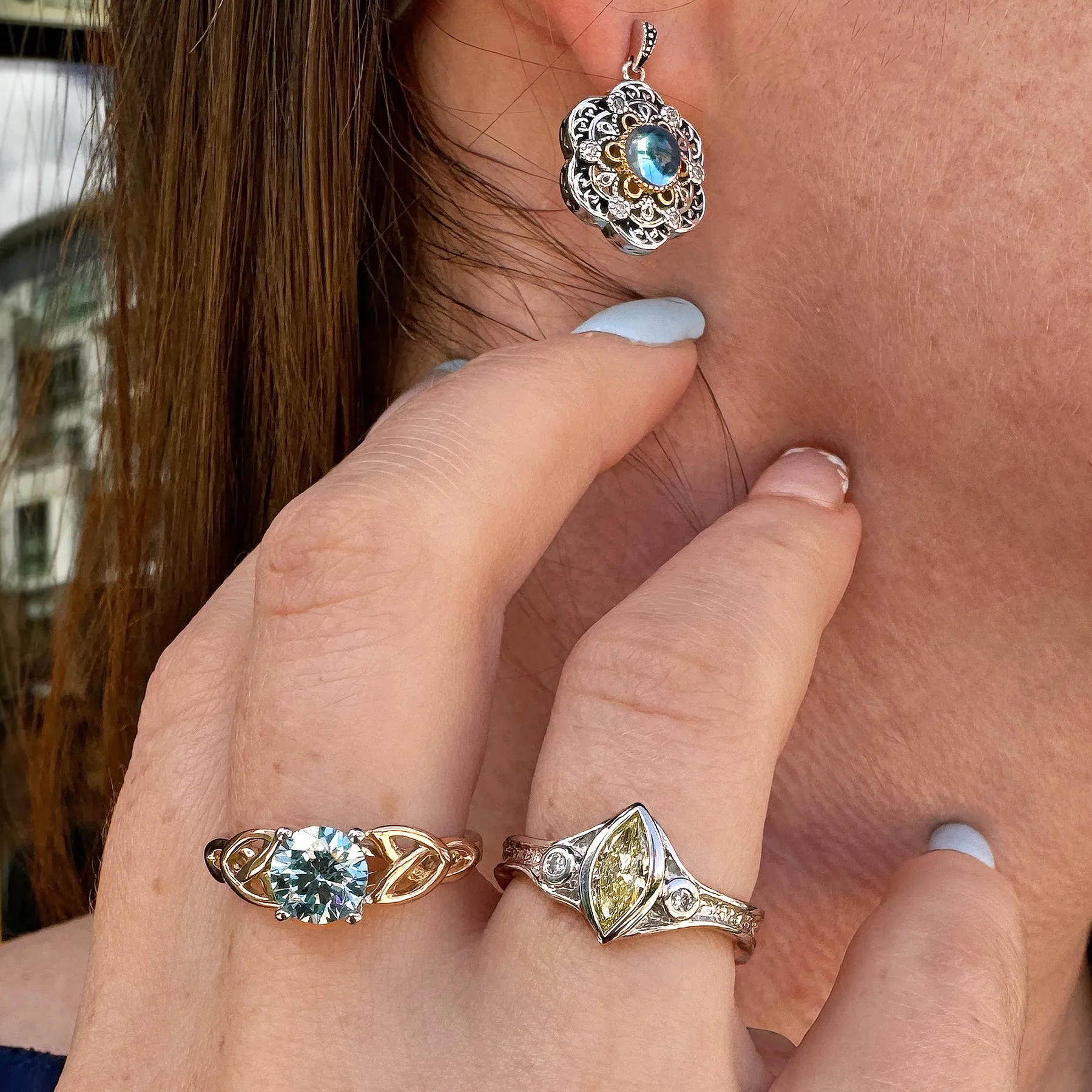 14k White and Yellow Gold 1.2ct Blue Moissanite Trinity Ring