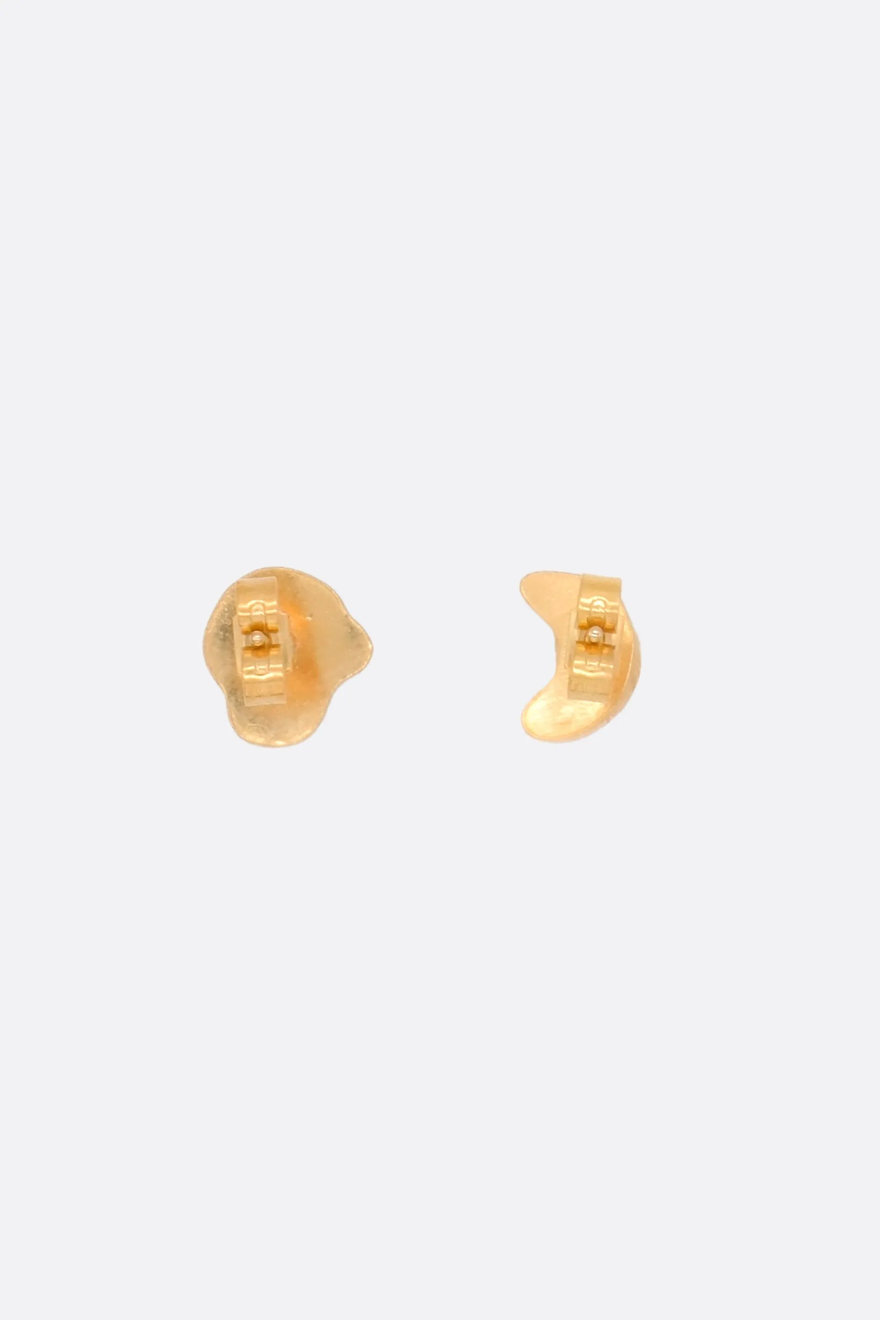 Mismatched stud earrings