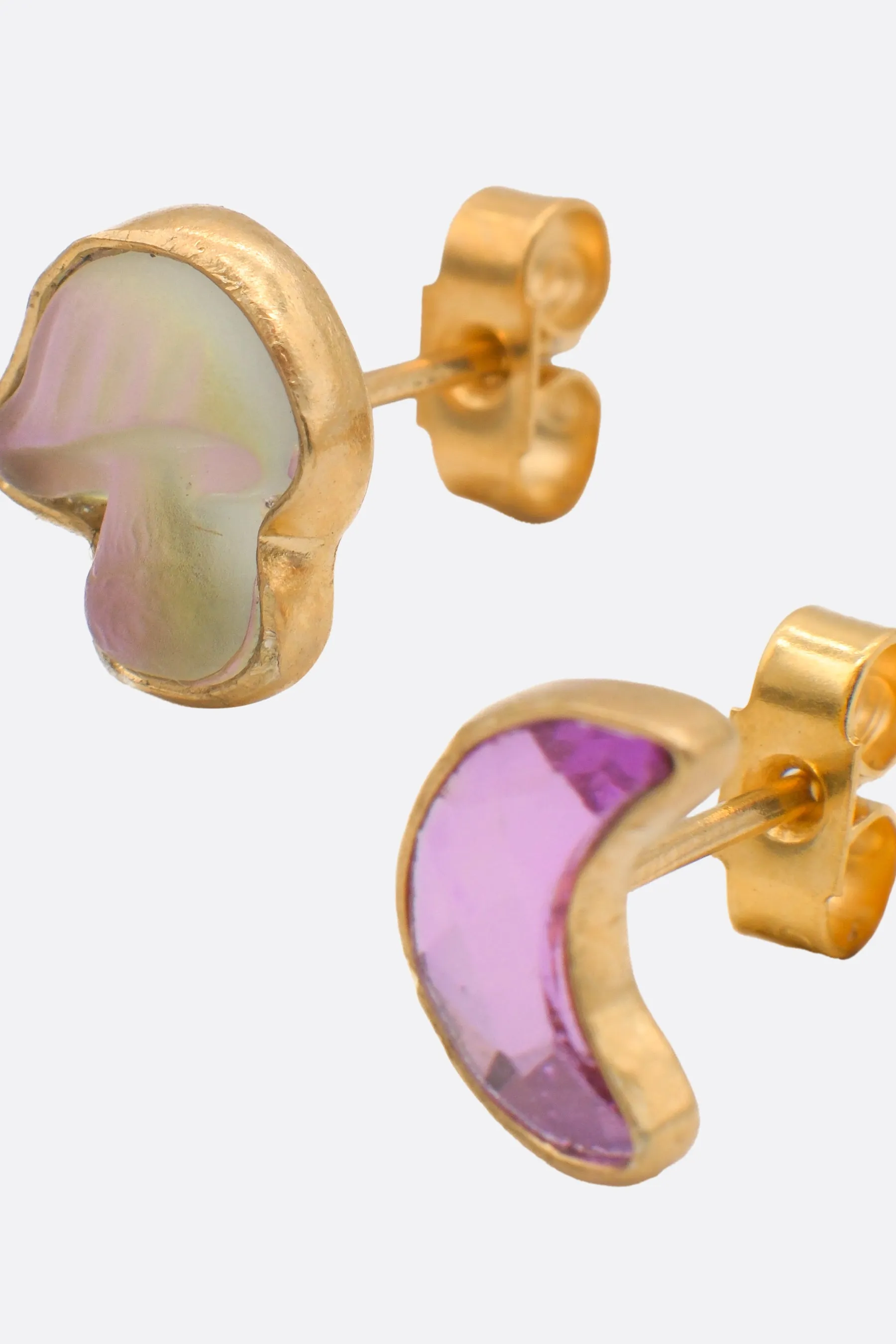 Mismatched stud earrings